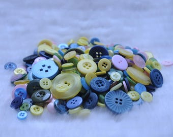 assortment of buttons in assorted sizes and colors