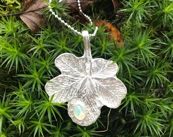 Real leaf pendant with one drop.