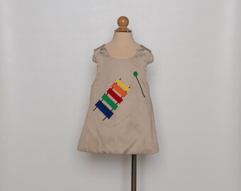 vintage 80s toddler girl's dress | xylophone novelty print | tan jumper