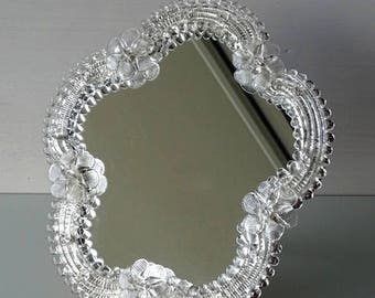 Venetian mirror of Murano glass Italy.