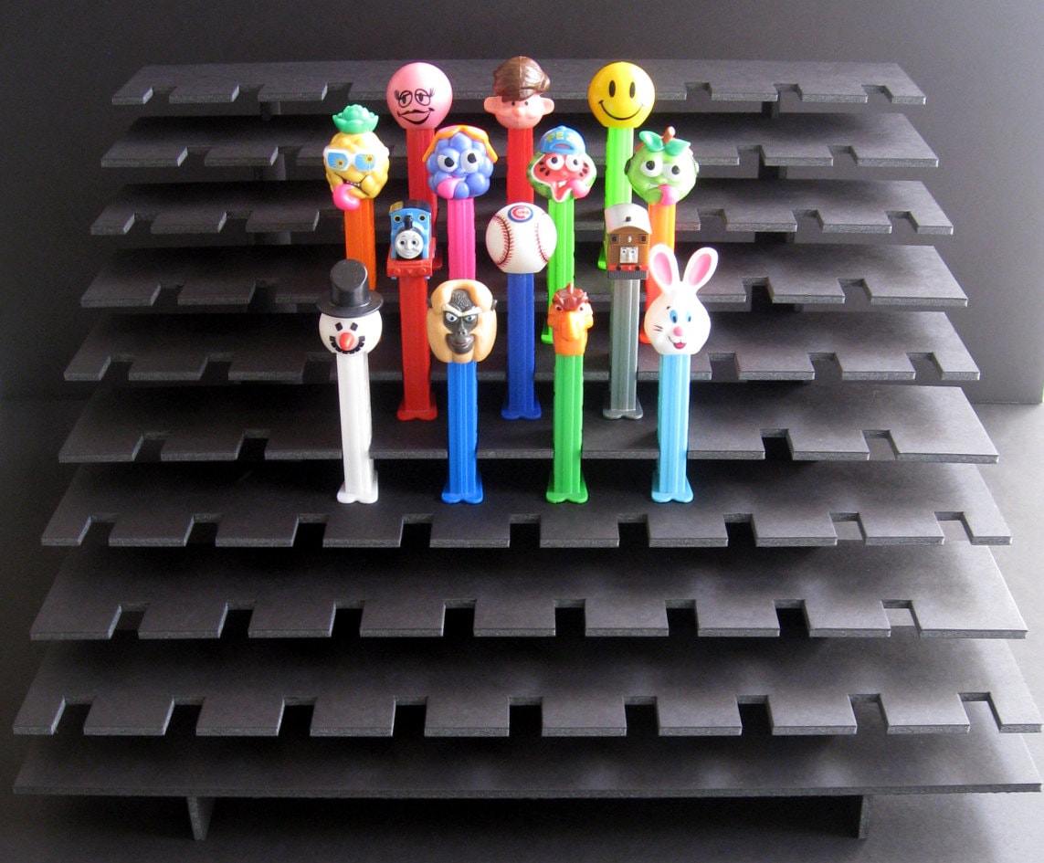77 PEZ Display Shelf Stadium Style Holds 77 Dispensers