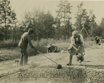 Men road construction with tools antique photo