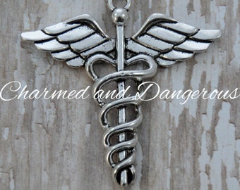 5 Caduceus charm (CM237)