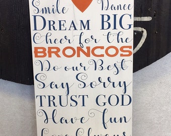 In this house Denver Bronco sign