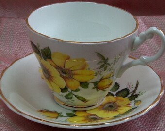 FINE BONE CHINA Cup and Saucer - Made in England by Consort - Yellow roses