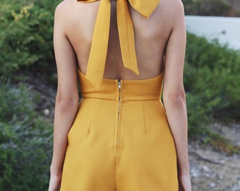 Modern mustard yellow romper/playsuit with bow / trendy + summer + spring