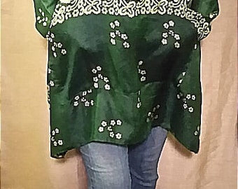 One-of-a-kind 100% up-cycled silk Holiday themed light weight tunic featuring cowl neck and front pocket detail