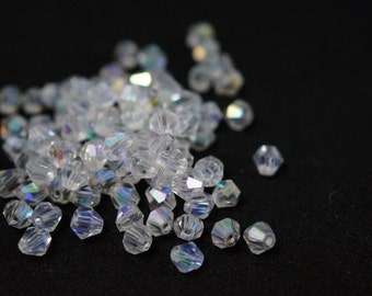 100 tops Crystal 4 mm BICONES