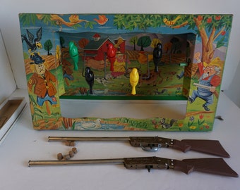 Antique Jaymar Mechanical Rotating Crow Shoot with Two Cork Rifles (1547)