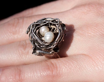 Twin's nest. Silver ring with white pearls. In form of nest with a two cute eggs.