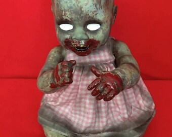 Ann Sane is a OOAK zombie baby art doll