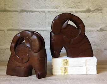 modern rams head bookend pair, mid century vintage dark wood stylized ram book ends, contemporary office library decor, impressively sized