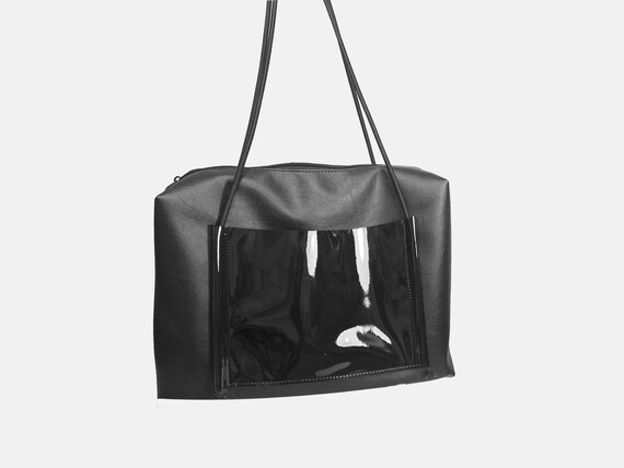 Large handbag black elegant black bag with two outside pockets in minimalist design companion for women