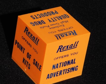 Vintage Rexall Drug Paperweight. Unknown year.