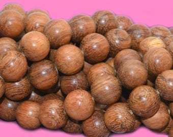 10 pearls precious bayong wood round 12mm Brown