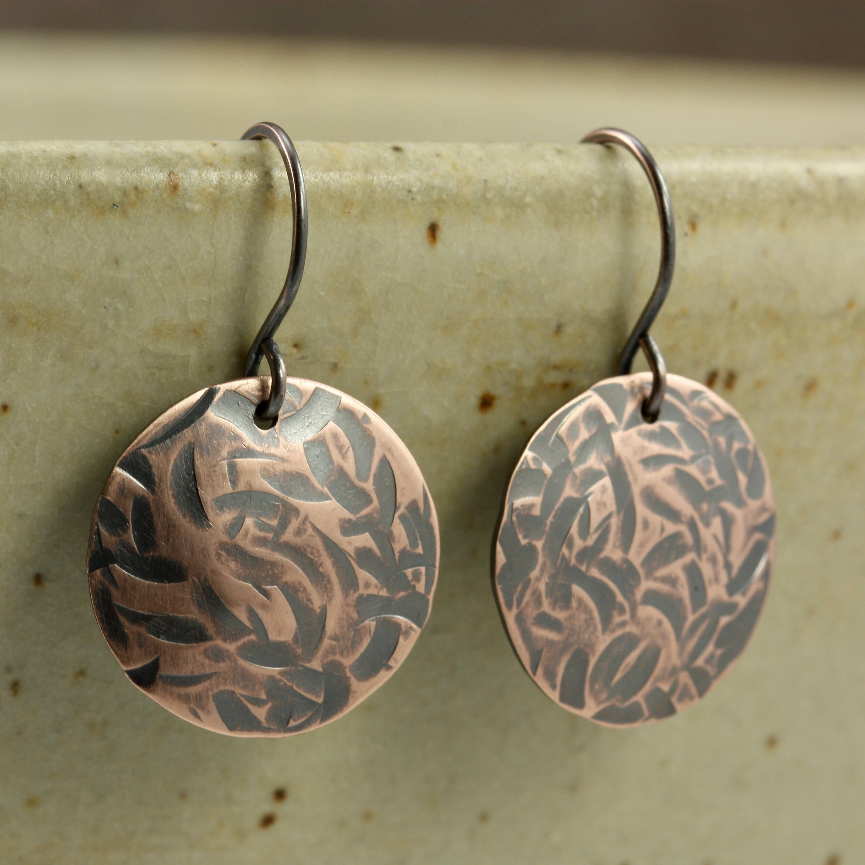 Hammered Copper Disc Earrings with Crescent Pattern Aged