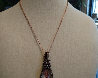 Quartz with mineral occlusions pendant necklace copper wire wrapped