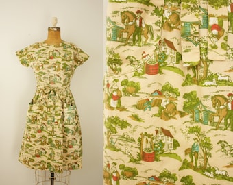 1950s Swirl dress | vintage 50s novelty print wrap dress