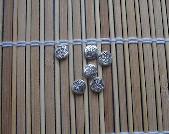Set of 6 metal beads stars