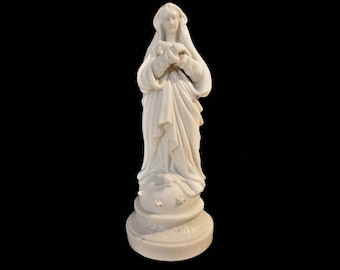 Small bisque statuette of the Virgin Mary