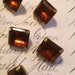 Vintage Topaz Colored Glass and Brass Buttons