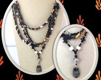 Ethnic necklace black Tuareg strips of cotton and batik beads - 1189