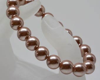 charming rose tone beaded bracelet