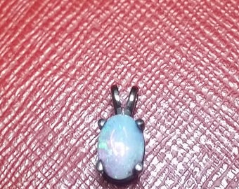 Genuine Opal Pendant in 14k gold in black rhodium