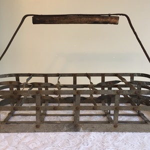 Milk bottle carrier holds 10 bottles