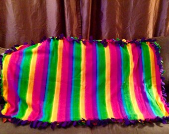 Enjoy this multicolor rainbow fleece blanket