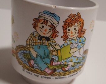 Raggedy Ann and Andy Coffee mug