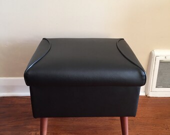 A Mid Century Modern Ottoman Footstool.