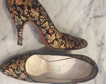 Early 1960s gold embossed black satin stiletto pumps.
