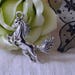 1 silver tone metal horse charm