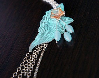 Handmade necklace with patina leaf pendant