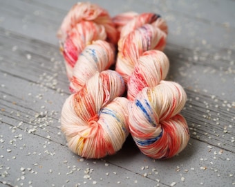 Cabana Peach Orange with Blue Yellow Red Speckled Hand Dyed Yarn // Superwash Merino and Nylon Sock Fingering Weight Yarn // Cape May Fiber