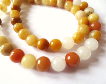 10 x 10mm Honey Jade round beads