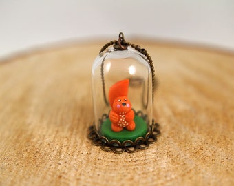 Mini squirrel under glass