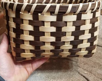 Two toned (brown and natural)hand woven basket
