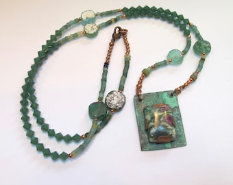 Necklace with swarovski and roman glass beads. handmade, one of kind
