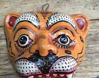 A handmade papier mache tiger mask from India