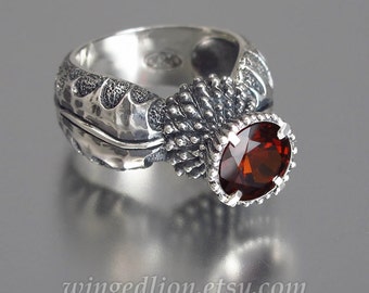 BLOOMING THISTLE silver ring with Garnet