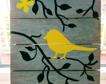 Spring bird painted on wood