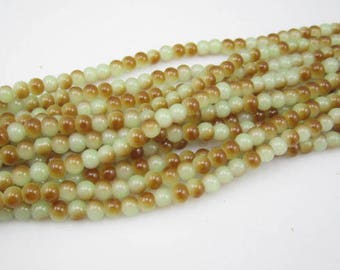 40 khaki and brown glass pearls