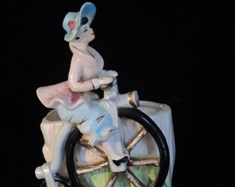 Vintage Victorian Woman Riding on Bicycle Planter Vase