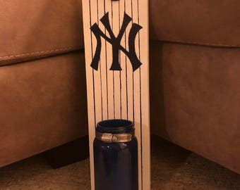 Wall mounted bottle opener