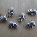 Set of 2 beads elephant 12 x 8.5 x 4 mm metal color: antique silver.