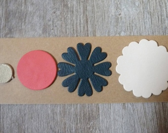 set of 4 fine leather, round and flower cutouts