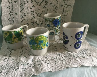 Four 1970s coffee mugs - blues and greens