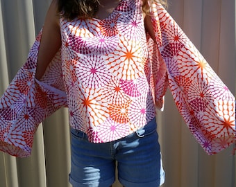 starburst print cotton wrap to stay sun smart and cover your arms